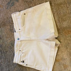 A pair of white AG Jeans denim shorts. Size 28R.
